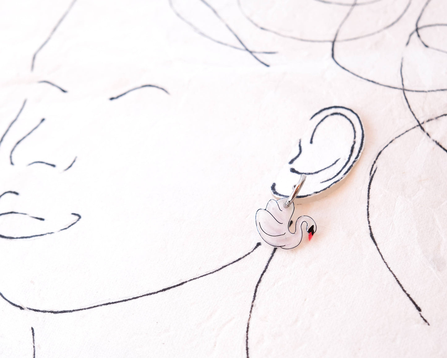 White Swan Elegant Silver Huggie Hoop Earrings