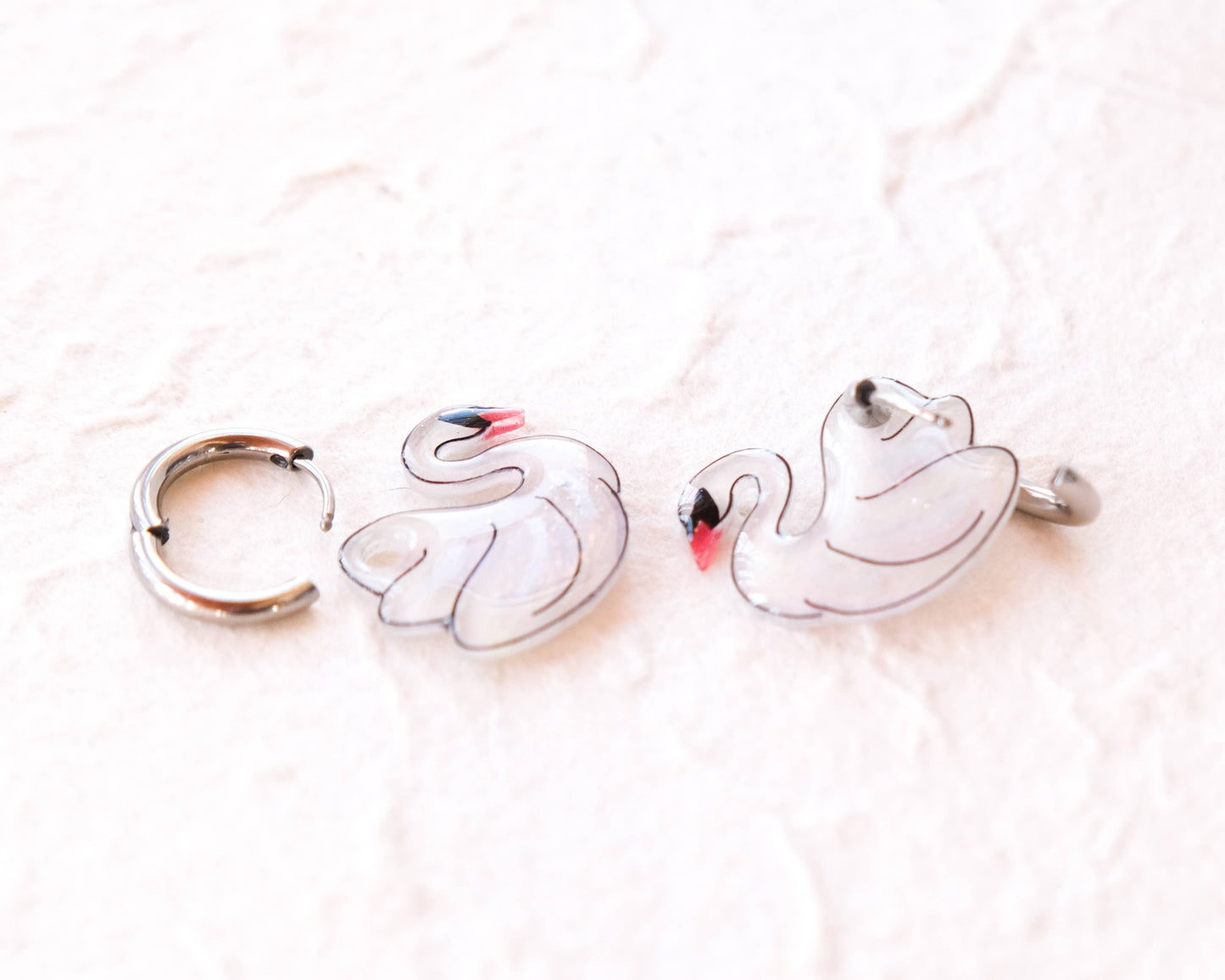 White Swan Elegant Silver Huggie Hoop Earrings