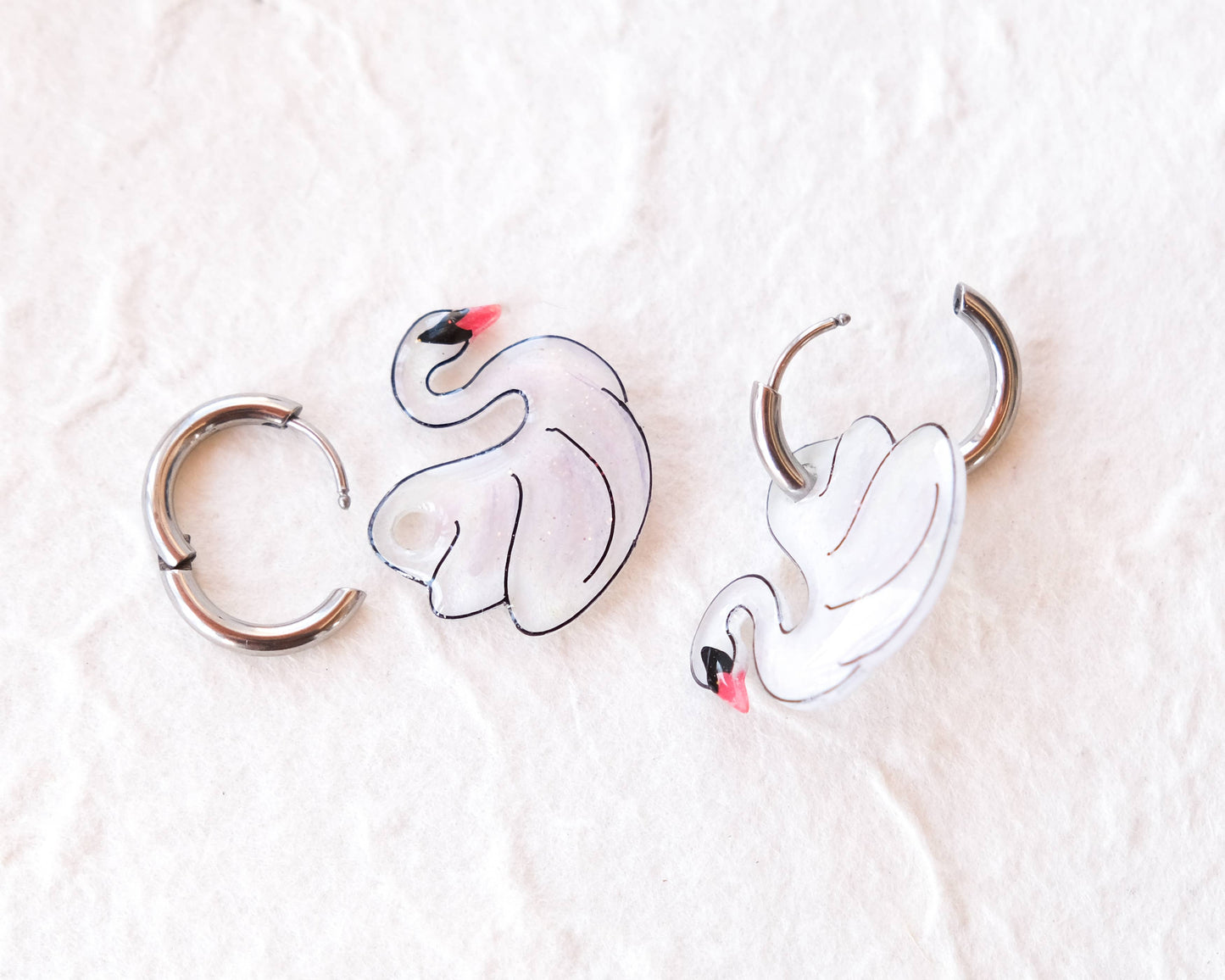 White Swan Elegant Silver Huggie Hoop Earrings